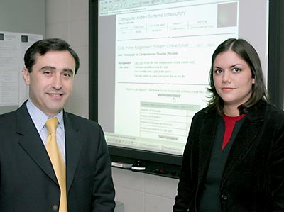 Photo of: Christodoulos Floudas (left) and graduate student Stacy Janak
